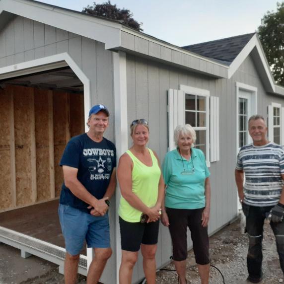 Chalet storage shed garage door