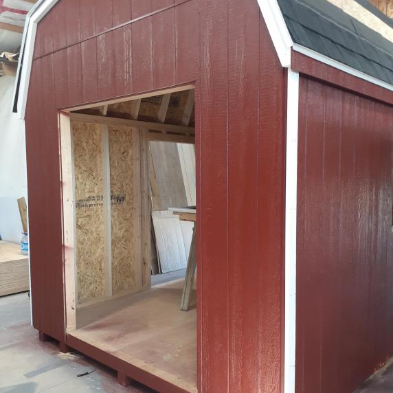 highwall gambrel barn style roof storage shed under construction